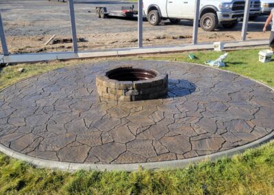 A backyard fire pit made of concrete